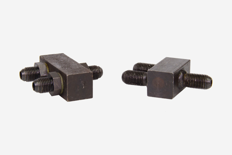 Figura: Distributore F-pezzo per linee idrauliche (piattaforme aeree a forbice)